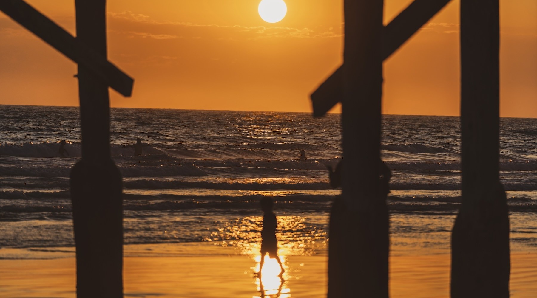 a sunset over a beach