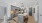a kitchen with a bar and a table