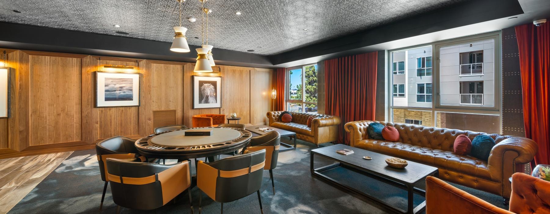 a room with a couch and tables